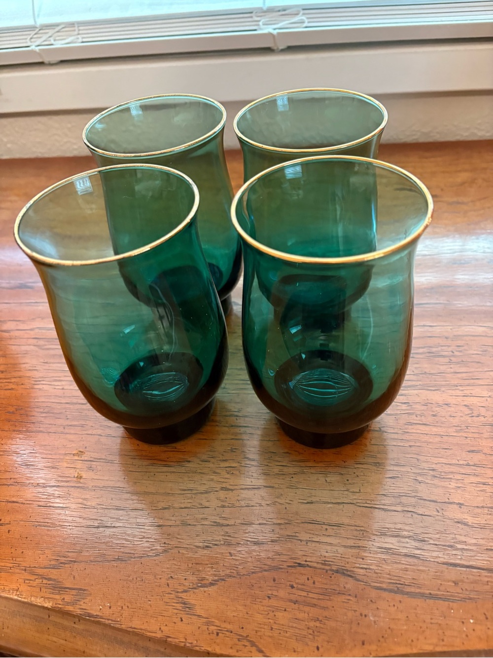 Vintage set of 4 tulip emerald green with gold rim tumblers. 5.5” tall